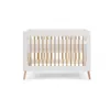 Obaby Maya Mini Cot Bed Standard Image Side View Raised Mattress baby bed