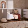 obaby-astrid-mini-cot-bed-white-lifestyle-2_72343b64-ad29-4f15-a612-2e0c6ad30343