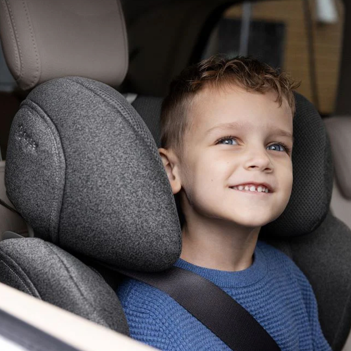 Child Strapped into their car seat.